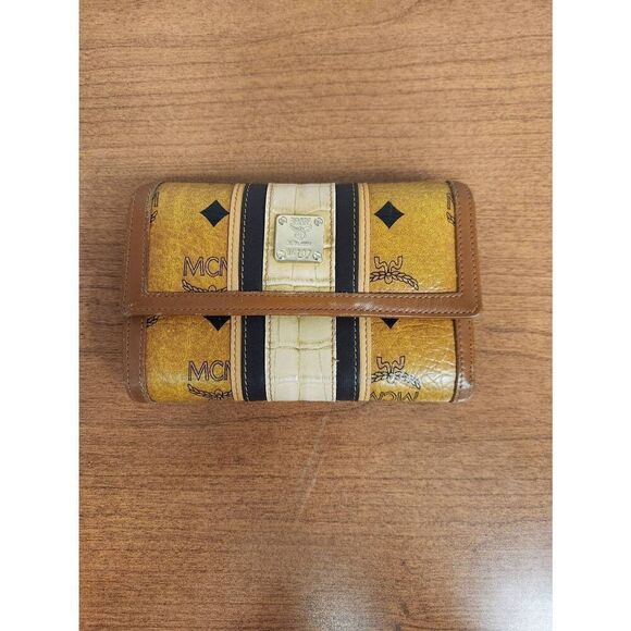 Mcm conganc leather compact wallet  Eight card slots and lots of compartments  E - Picture 1 of 13